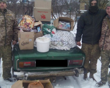 Представители CIMIC Avdeevka передали воинам помощь и окунулись в прорубь